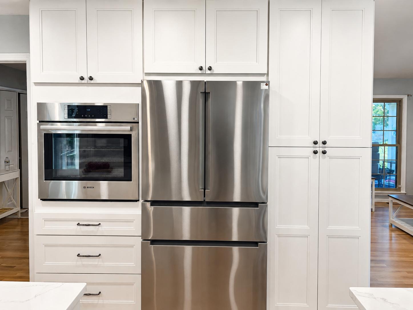 Built in Cabinetry, oven, and fridge in Burke REmodel