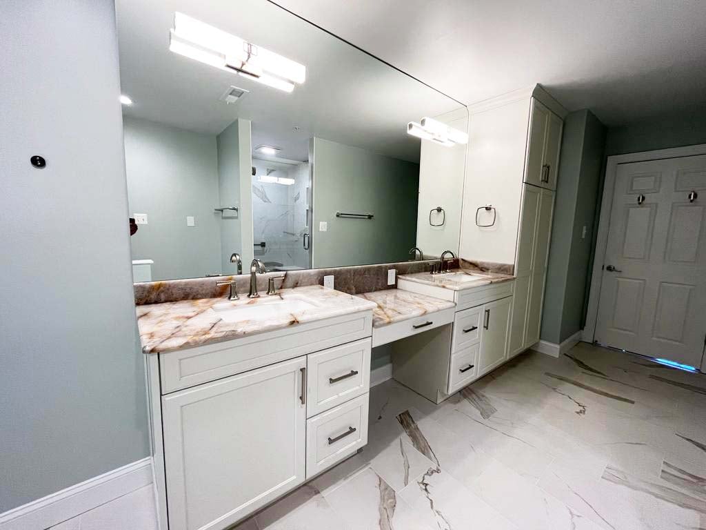 Spacious master bath featuring dual sinks and large walk-in shower by Anchor Remodel in McLean, VA.