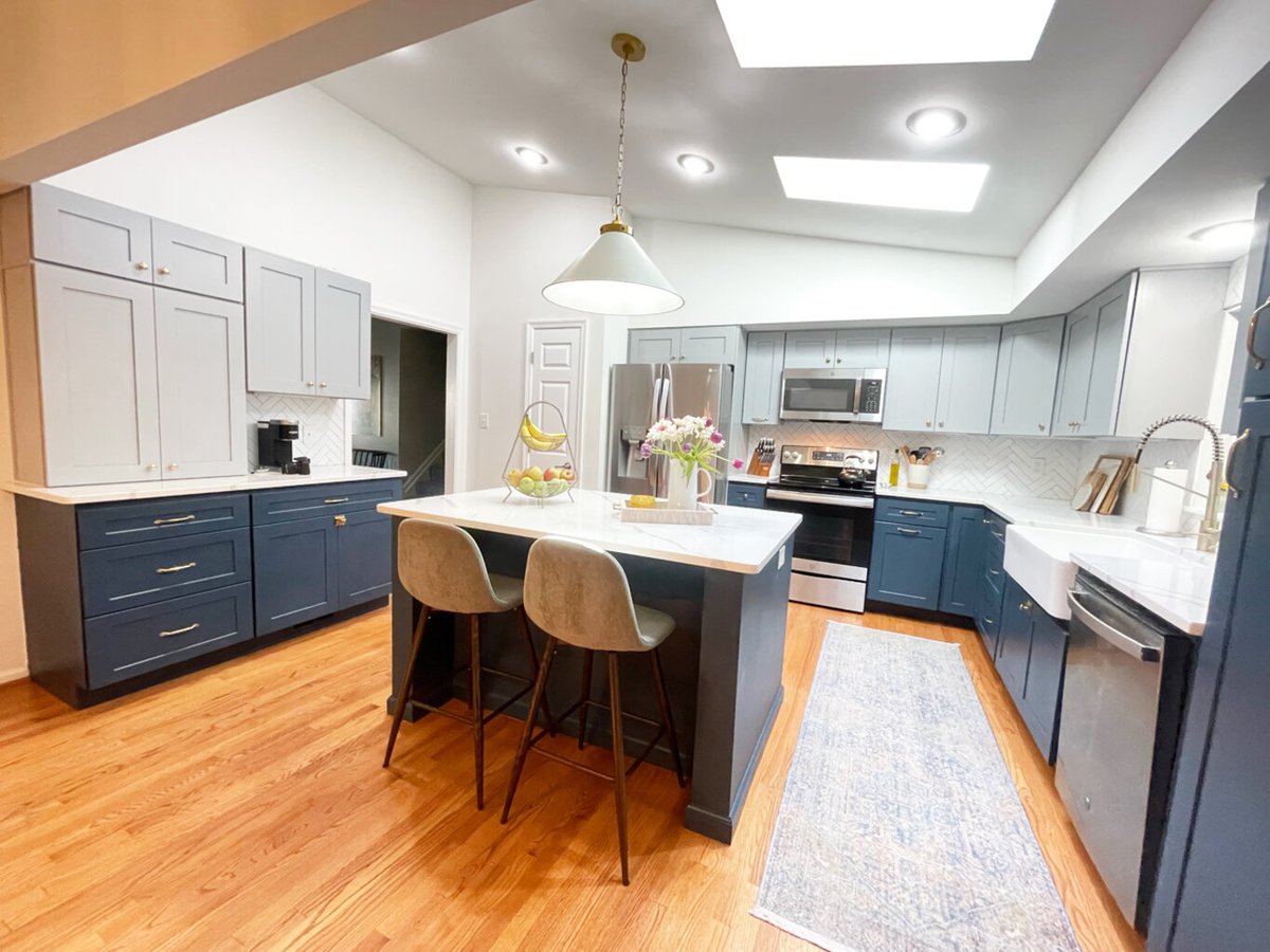 Full kitchen remodel featuring stainless appliances and navy-gray cabinetry by Anchor Remodel in Springfield, VA.