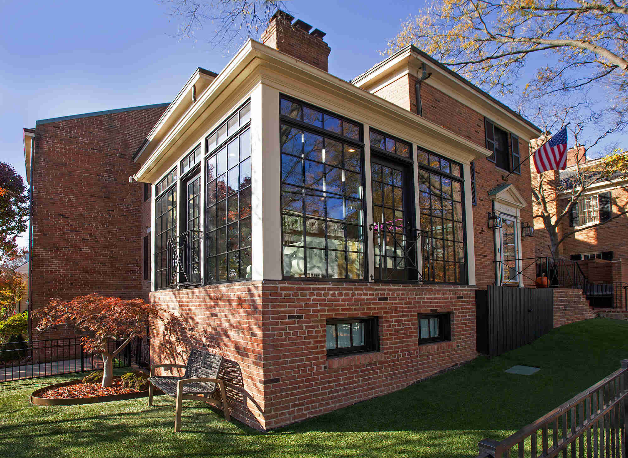 Angled view of sunroom addition with black grid windows by Anchor Remodel in Alexandria, VA Angled view of sunroom addition with black grid windows by Anchor Remodel in Alexandria, VA