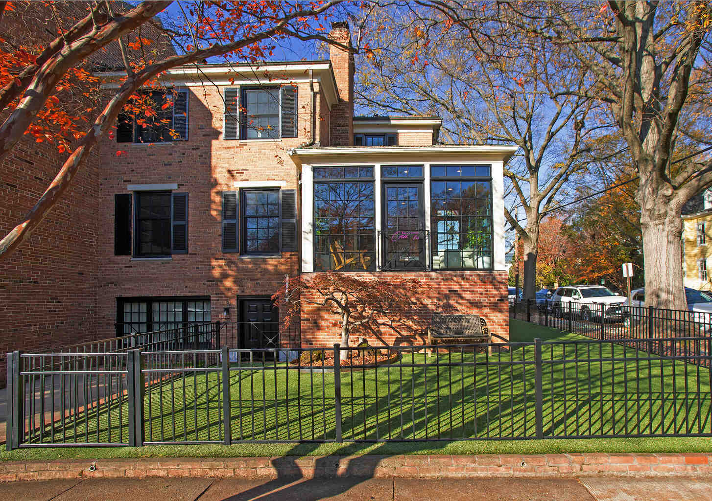 Brick exterior sunroom addition with large black-trimmed windows by Anchor Remodel in Alexandria, VA Brick exterior sunroom addition with large black-trimmed windows by Anchor Remodel in Alexandria, VA