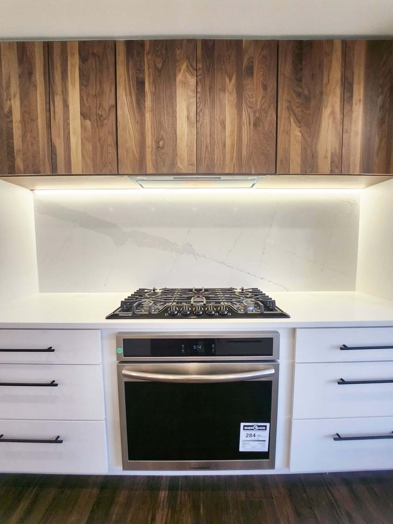 Kitchen design with energy-efficient oven and streamlined cabinetry by Anchor Remodel in Alexandria, VA.