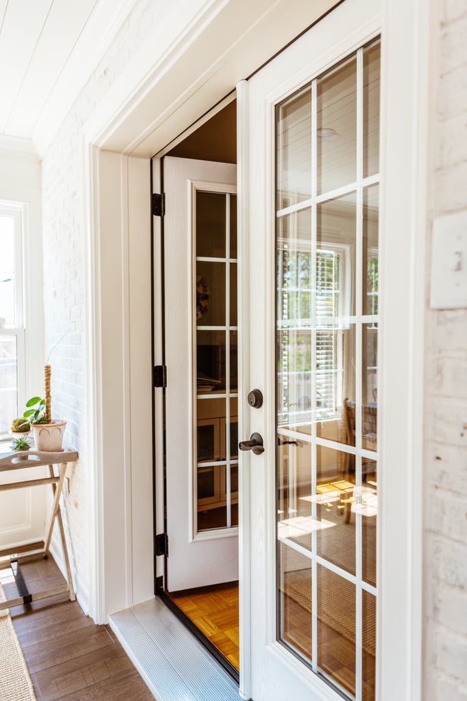 French doors leading from custom sunroom to interior space by Anchor Remodel in Alexandria, VA